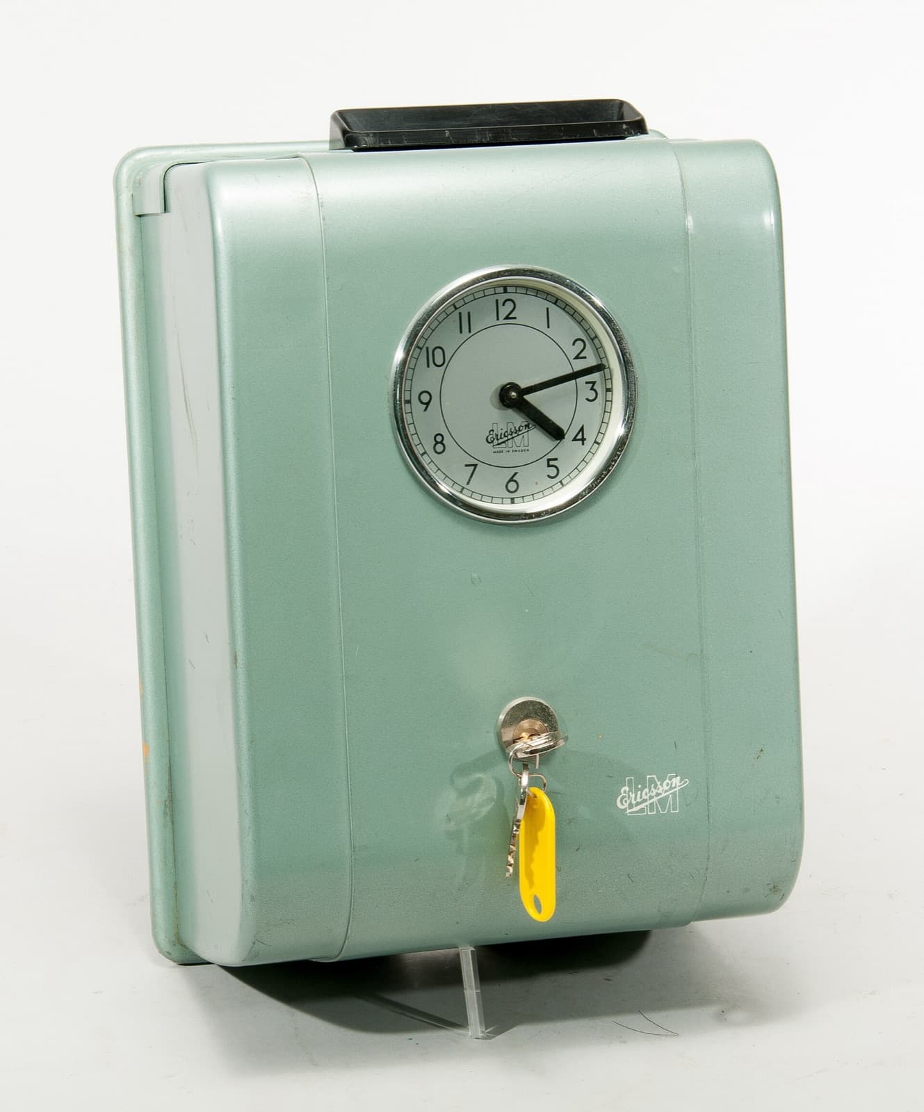 Ljusgrönt stämpelur från LM Ericsson, 1950-tal